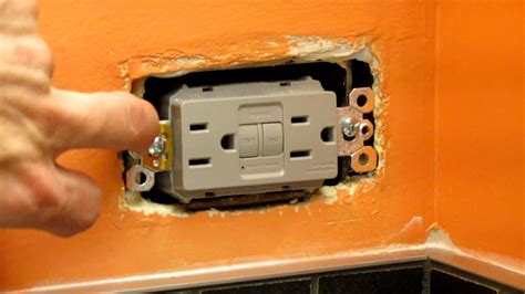 metal wall outlet box loose|how to tighten electrical outlet.